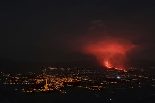 Lava spews from a volcano on the Canary island of La Palma, Spain