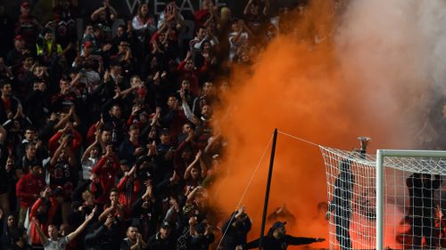 The clashes started after a flare was set off among Wanderers fans in the grandstand at Pirtek Stadium in Parramatta. (AAP)