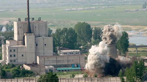 In this June 27, 2008, file photo released by China's Xinhua News Agency, the cooling tower of the Yongbyon nuclear complex is demolished in Yongbyon, North Korea.