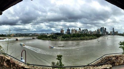 Brisbane hunkers down as foul weather approaches