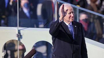 President Joe Biden reacts as he prepares to deliver his inaugural address on the West Front of the U.S. Capitol on Wednesday, Jan. 20, 2021 in Washington.