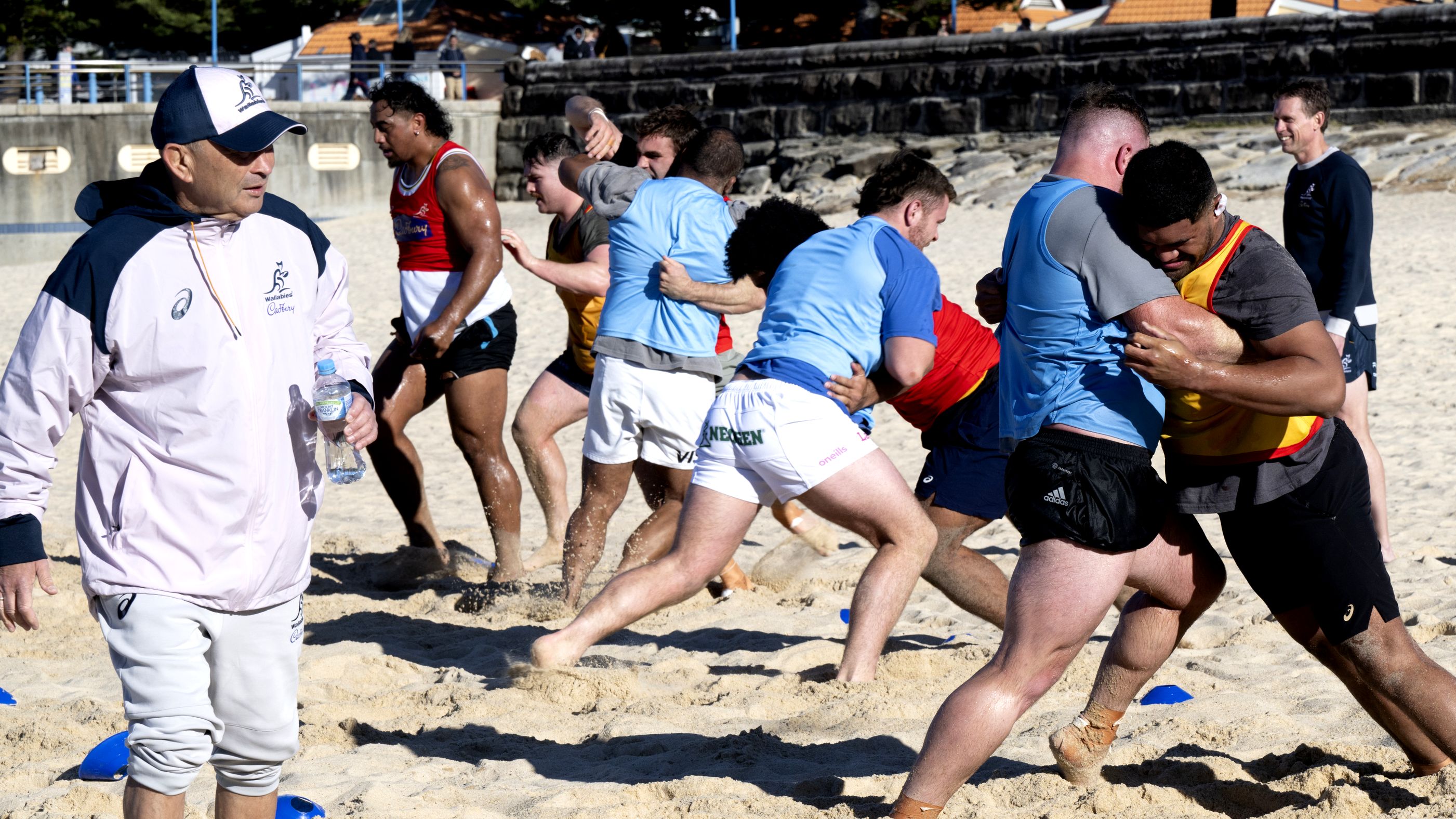 Wallabies players train on Coogee Beach.