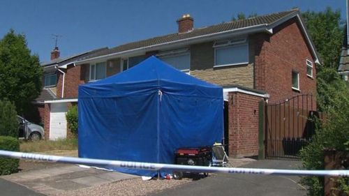 A blue forensic tent was set up in the front yard following the 28-year-old nurse's arrest. (AAP)