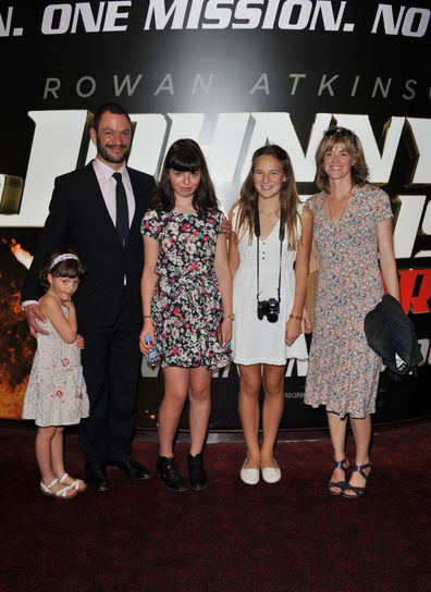 Catherine Fitzgerald and Dominic West attend the Johnny English Reborn UK premiere with their children in 2011