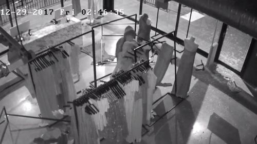 The thieves were caught snatching the designer clothing from the racks. (NSW Police)