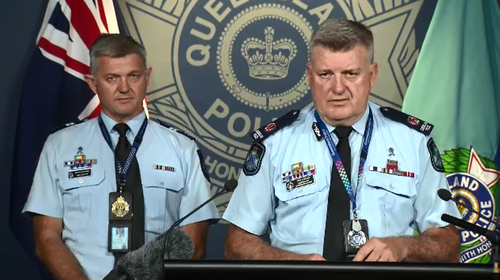 Senior Constable Neill Scutts (L) and Assistant Commissioner Michael Condon (R).