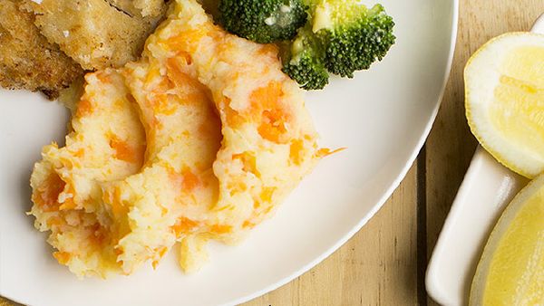 Pork schnitzel with orange vegetable mash