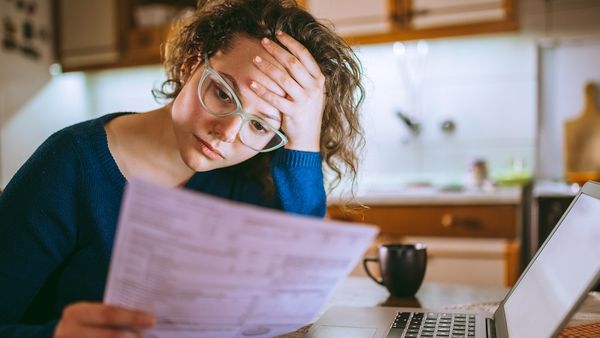 Woman reading financial statements