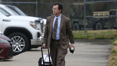 Special Prosecutor walks in to the Cabot Readiness Center for the final day of the trial of former Lonoke County sheriff's deputy Michael Davis, who was convicted of negligent homicide on Friday, March 18, 2022, in Cabot. Davis shot 17-year-old Hunter Brittain during a traffic stop last year.  More photos at www.arkansasonline.com/319trial/ (Arkansas Democrat-Gazette/Thomas Metthe)