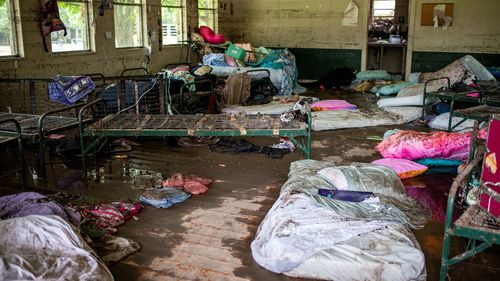 Items lie scattered inside a cabin at Camp Mystic after deadly flooding in Kerr County, Texas, on July 5.
