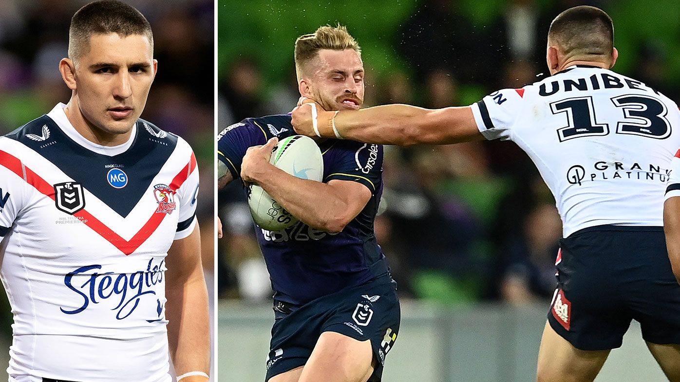 Cameron Munster of the Storm is tackled high by Victor Radley of the Roosters during the round six NRL match between the Melbourne Storm and the Sydney Roosters at AAMI Park on April 16, 2021, in Melbourne, Australia. (Photo by Quinn Rooney/Getty Images)