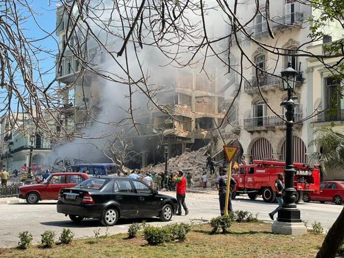 An explosion rocked Havana, Cuba on Friday and destroyed the Hotel Saratoga.  Cuban police and firefighters searched the rubble for survivors.  It was not clear what caused the explosion in the city center.