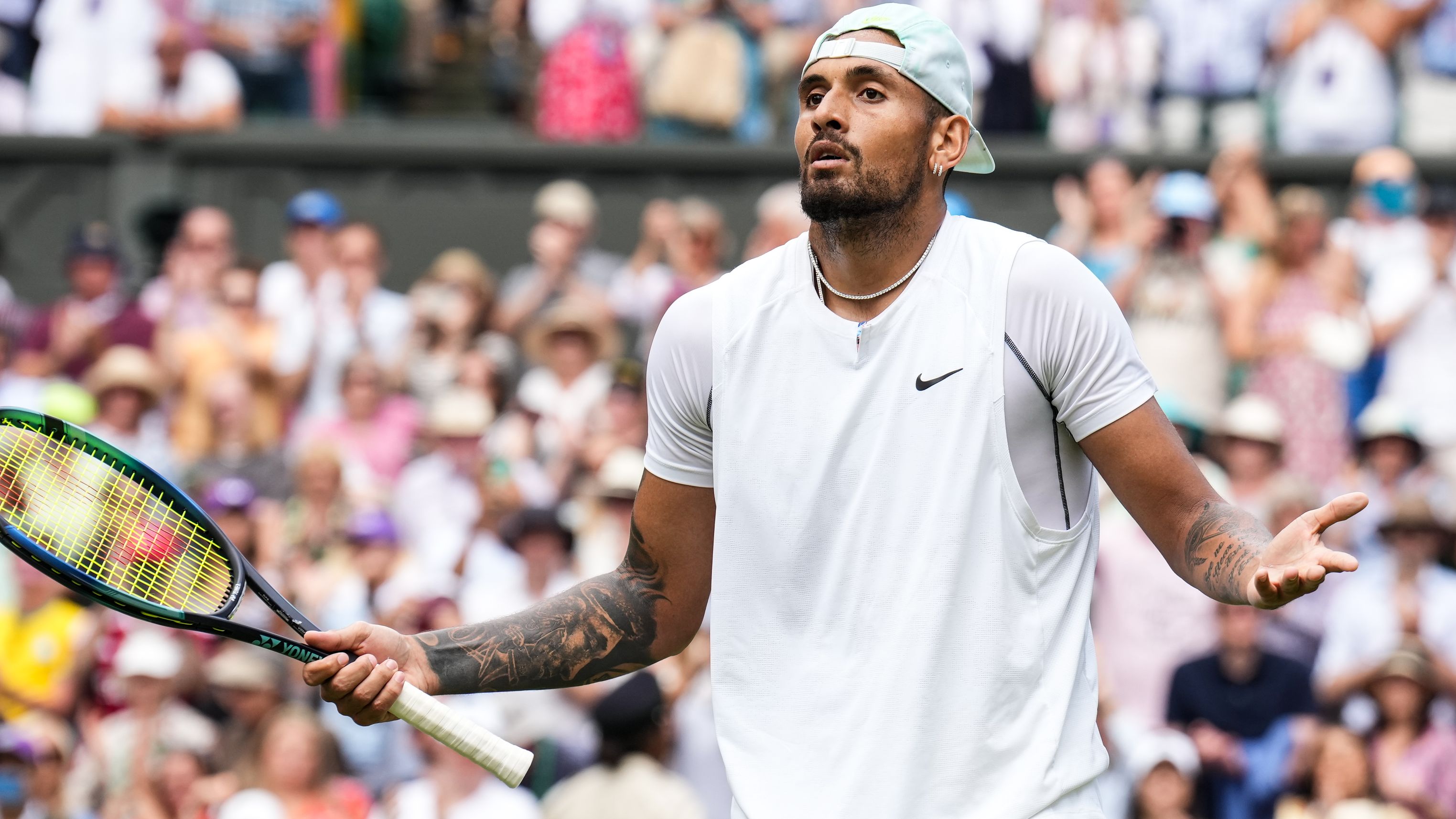 Nick Kyrgios of Australia celebrates victory in the fourth round Match against Brandon Nakashima during day eight of The Championships Wimbledon 2022.