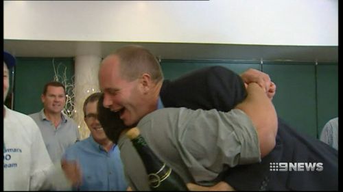 In happier times: Mr Monsour celebrating with brother-in-law former Premier Campbell Newman. Picture: 9NEWS