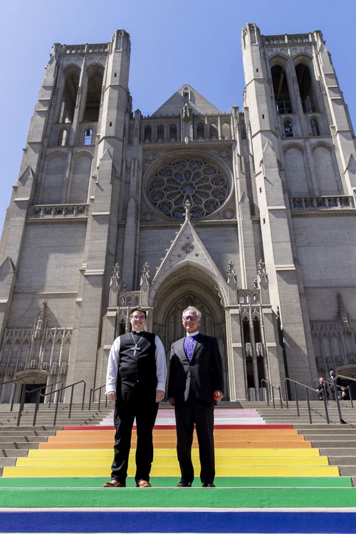 Bishop Megan Rohrer, left, and Bishop Marc Andrus stood on the rainbow steps before Bishop Rohrer's installation ceremony.