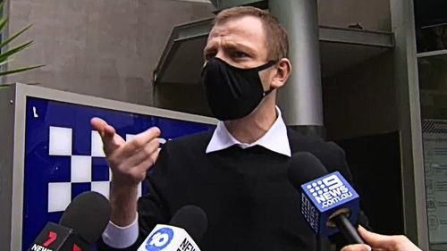 Tim Warburton, 32, pleaded guilty to wilful damage in Brisbane Magistrates Court this morning after his friend, Ryan Mitchem, broadcast the disrespectful act on social media on June 29.