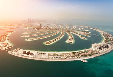 Palm Jumeirah is an artificial archipelago off the coast of which city?