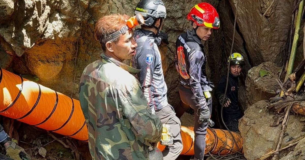 Race to save seven people trapped in flooded cave in Laos