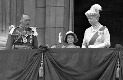 Britain's Queen Elizabeth II, then Princess Elizabeth, centre, waves as she stands on the balcony of Buckingham Palace, London, with her grandparents King George V and Queen Mary, in this May 6, 1935 photo. Princess Margaret is just visible over the balcony edge. The balcony appearance is the centerpiece of almost all royal celebrations in Britain, a chance for the public to catch a glimpse of the family assembled for a grand photo to mark weddings, coronations and jubilees.