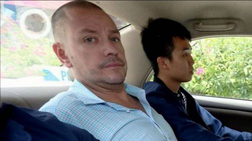 Andrew Gosling, 47, has been charged over the death of a grandfather in Singapore.