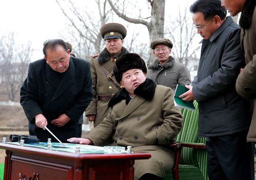 Undated picture released from North Korea's official Korean Central News Agency on March 15, 2016 shows North Korean leader Kim Jong-Un being briefed by advisors. (AFP PHOTO/KCNA VIA KNS)