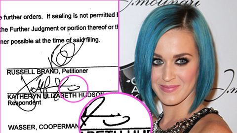 Pic: Katy Perry signs divorce papers with a smiley face