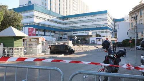 Security forces secured the entries of the military hospital where the Tunisian president died.