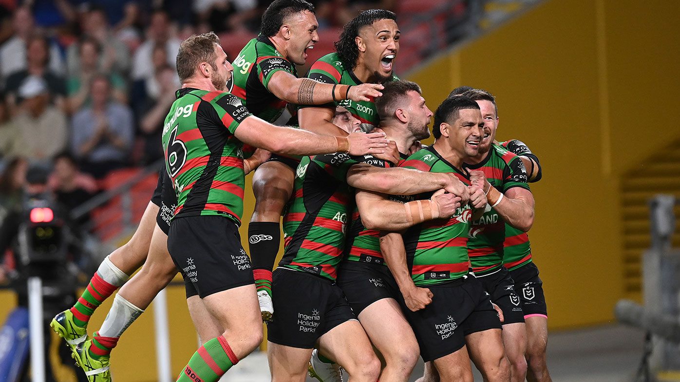  Cody Walker of the Rabbitohs celebrates with team mates after scoring a try during the NRL Preliminary Final match between the South Sydney Rabbitohs and the Manly Sea Eagles at Suncorp Stadium on September 24, 2021 in Brisbane, Australia. (Photo by Bradley Kanaris/Getty Images)