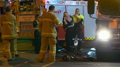 The cyclist was trapped under the sweeper in the crash.