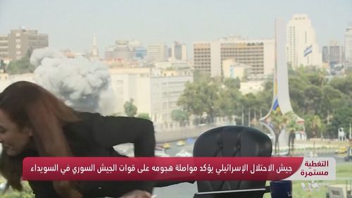 One video from a Syrian television channel showed the Ministry of Defence building being hit live on air during the latest strikes, forcing the anchor to take cover.