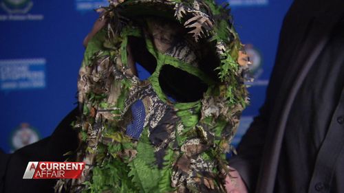 The attacker wore a camouflage hood much like this.