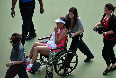 <b>The US Open has seen a day of drama after China’s Peng Shuai departed her semi-final in a wheelchair.</b><br/><br/>China’s Shuai was forced to abandoned her match trailing Caroline Wozniacki 7-6 (7-1) 4-3 after twice collapsing with cramp.<br/><br/>Her tearful exit provoked a verbal barrage from tennis great John McEnroe who labelled the moment as a ‘black eye’. <br/><br/>But Shuai’s dismay was Wozniacki’s joy, the dramatic end to the match a stunning mixture of misery and ecstasy ...<br/>