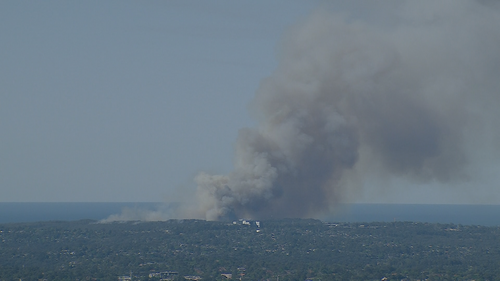 A thick plume of smoke was seen from the fire in Sydney's North.