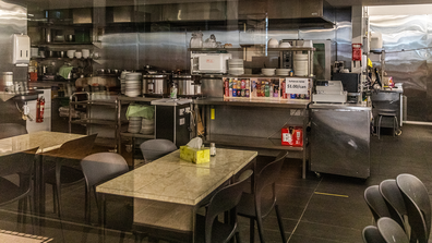 An empty restaurant and kitchen is seen closed for business on September 25, 2020 in Melbourne, Australia. Victoria 