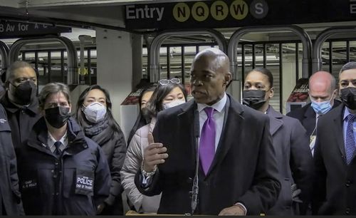 Mayor Eric Adams, with city law officials holding a press conference inside a subway station after a woman was pushed to her death in front of a subway train at the Times Square station.