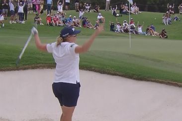 Ashleigh Buhai celebrates her hole out from the bunker at the fourth hole.