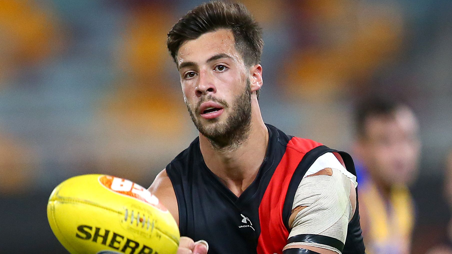 Essendon gets respite from player exodus as Kyle Langford re-signs