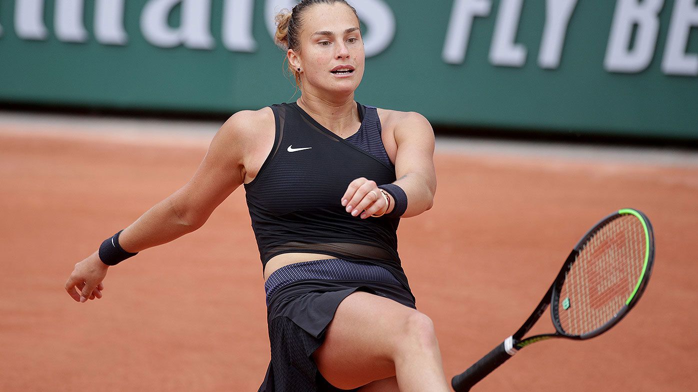 Aryna Sabalenka of Belarus kicks out at her tennis racket after throwing it to the floor during her loss against Anastasia Pavlyuchenkova of Russia on Court Simonne Mathieu during the third round of the singles competition at the 2021 French Open Tennis Tournament at Roland Garros on June 3rd 2021 in Paris, France. (Photo by Tim Clayton/Corbis via Getty Images)