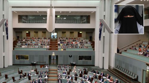 Women in burqas will no longer be required to sit behind protective glass while attending parliament. (AAP)