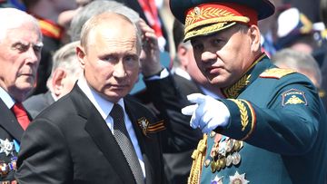 Vladimir Putin and Russian Defence Minister Sergei Shoigu during the 2012 Victory Day military parade.