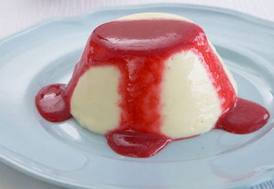 White chocolate panna cotta with raspberry coulis