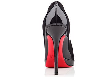 Which footwear company has a trademark red-soled women's shoes?