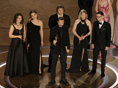 Raney Aronson-Rath, Mstyslav Chernov and Michelle Mizner accept the Best Documentary Feature Film for "20 Days in Mariupol" onstage during the 96th Annual Academy Awards at Dolby Theatre on March 10, 2024 in Hollywood, California. 