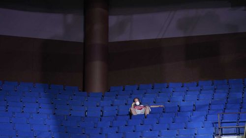 Some Trump supporters took advantage of the many empty seats to socially distance.