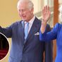 Queen Camilla spotted giving King's backside a 'love tap'
