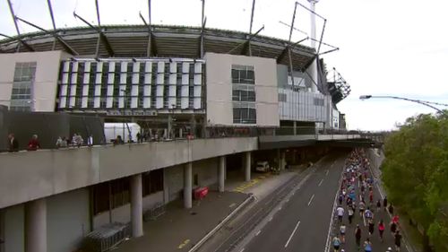 Runners made their way to the finish line at the iconic Melbourne Cricket Ground. (9NEWS)