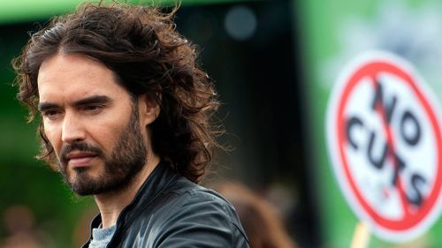 Russell Brand has criticised global politics and world leaders in his new book, Revolution. (AAP)