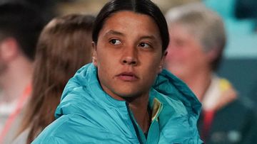 An emotional Sam Kerr is pictured on the sideline as the Matildas get their World Cup campaign started against Ireland.