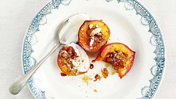 Honey-baked peaches with almond praline and mascarpone