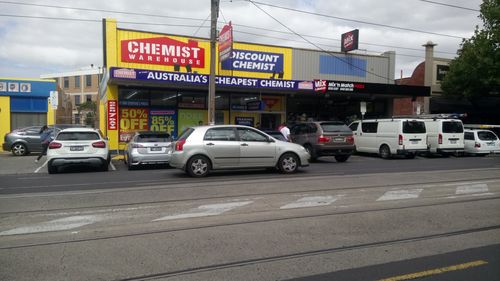 The source said the crowd steadily increased outside Chemist Warehouse in Essendon this morning. (Supplied)